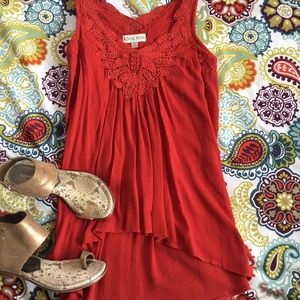 Reddish orange flowy tank